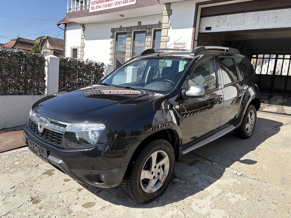 Dacia duster 1,6 benzina +Gpl de fabrica /An 2013/4x2/Aer conditionat /Tapiterie piele