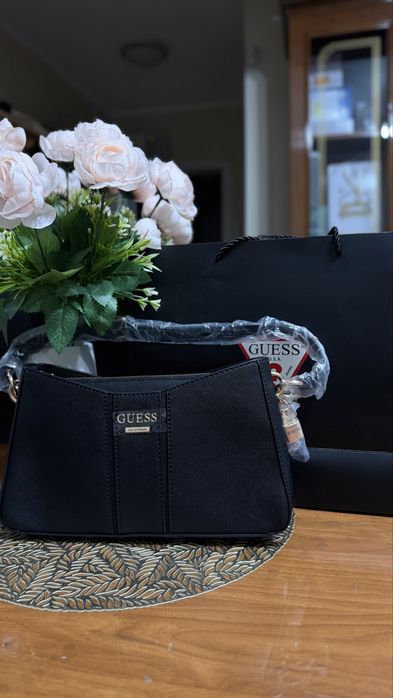 Оригинал сумки Guess