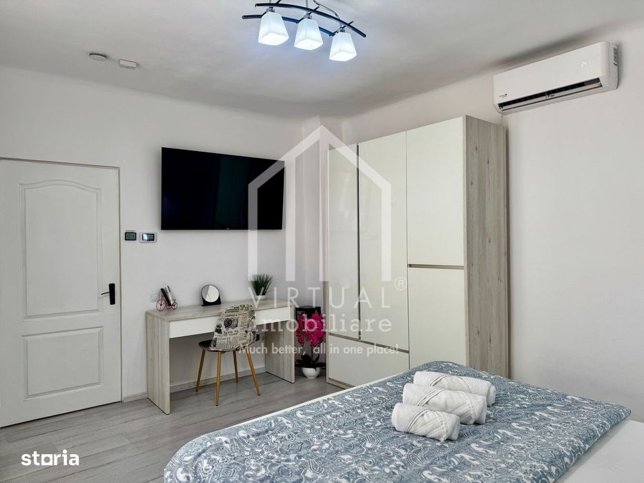 Garsoniera la casa cu curte privata, 28mp utili + curt privata 90mp — fotografia 1