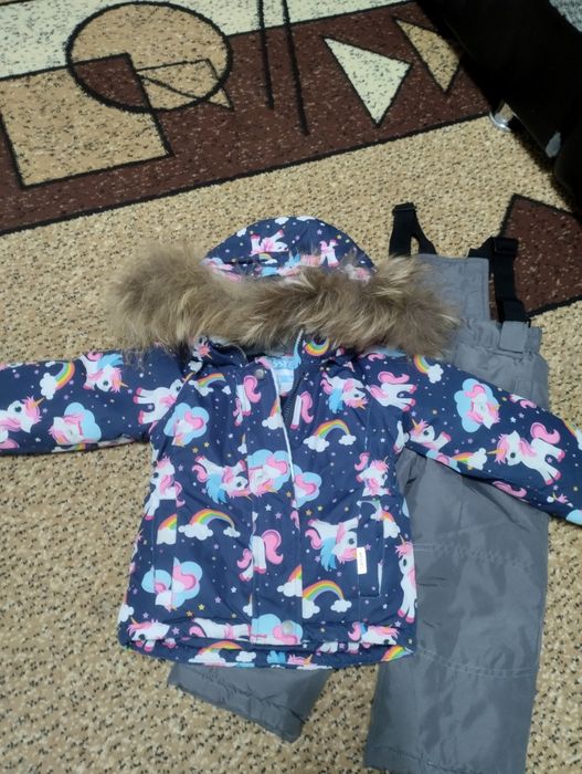Продам комбинезон зимний для девочки