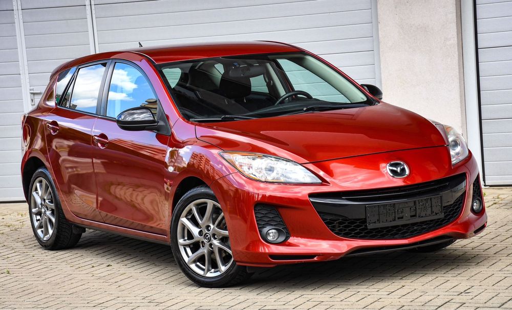Mazda 3 model Kenko-Edition benzina 2013 105 cai