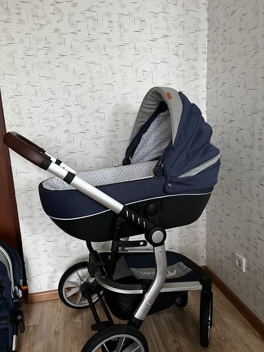 Коляска с автолюлкой