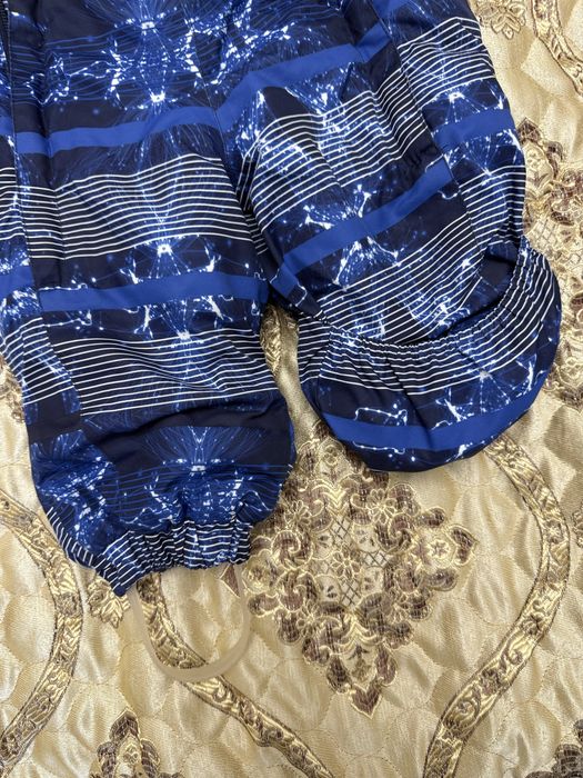 Продам зимний комбинезон Huppa