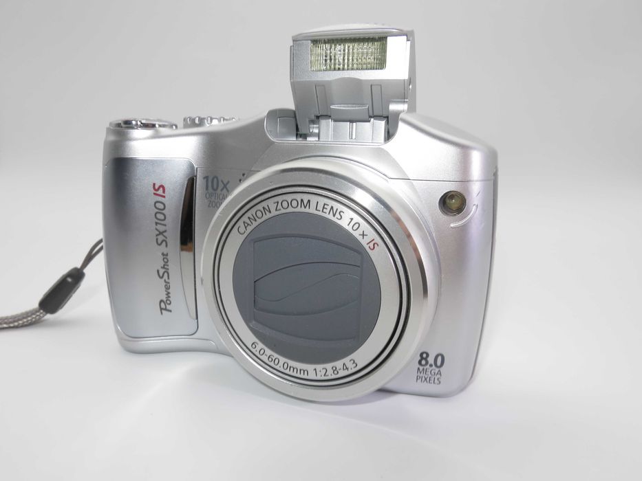Canon PowerShot SX100 компактен цифров фотоапарат в сребърен цвят, дигитална камера в отлично състояние, 10х оптичен зум, 8MP, тестван работи супер