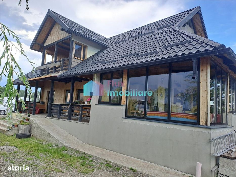 Casa cu teren si doua pastravarii in Fantana Mare