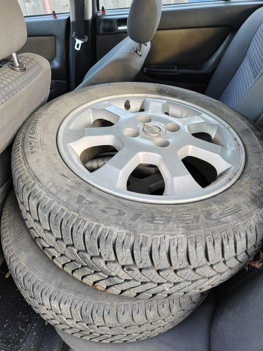 Vând cauciucuri all season Opel cu jante aluminiu, 195 /60 R15