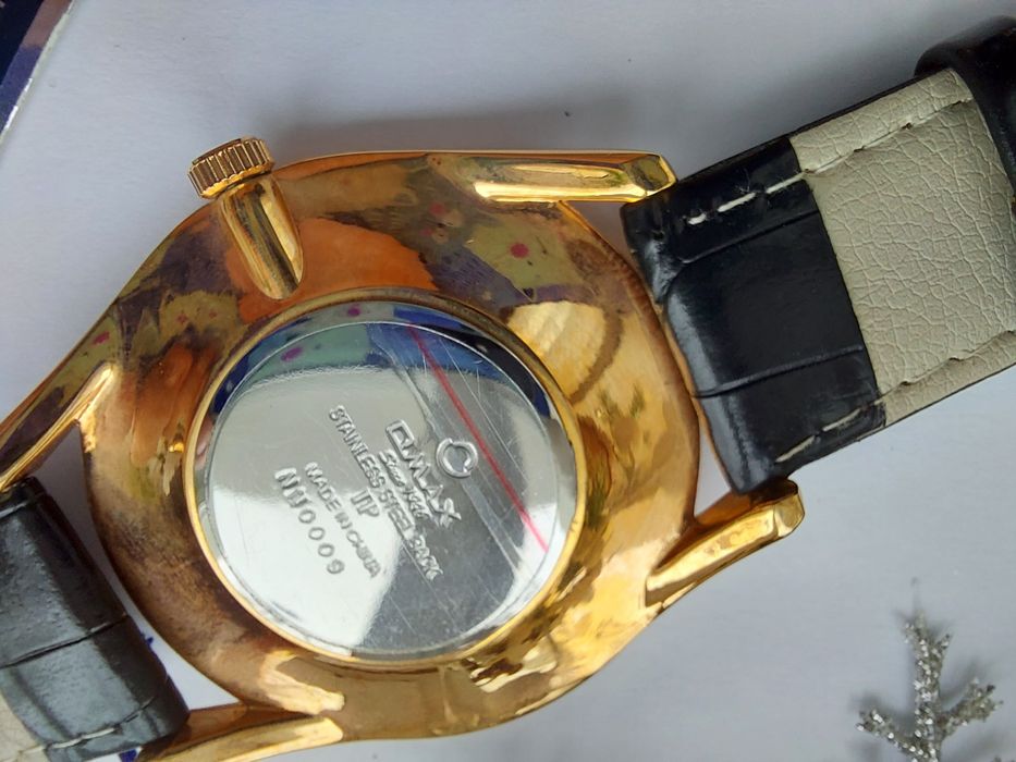 Новые наручные часы. Фирма Omax.