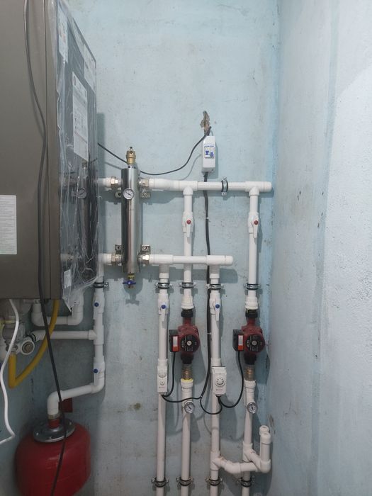 Установка двухконтурных котлов , радиаторов, теплый пол, коллекторов.