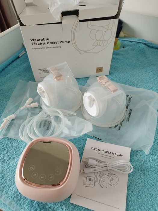 Электронный молокоотсос