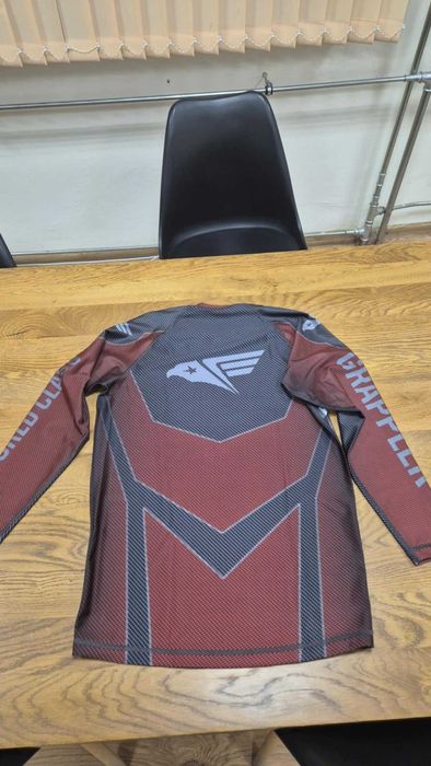Rashguard на федерацията American Grappling