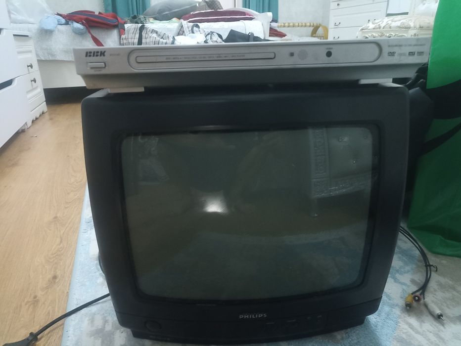 Телевизор вместе с DVD в отличном состоянии.