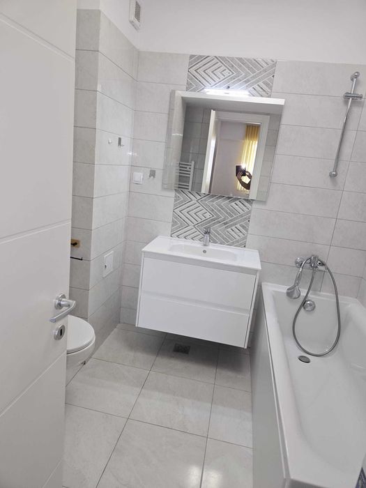 Apartament cu o camera si loc de parcare in cladire - Fara garantie