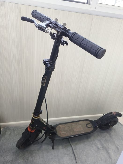 Продам самокат б/у в хорошем состоянии