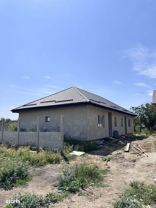 Casa pe parter 3 cam+Pod.Teren 210mp.