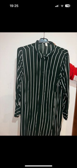 Camasa lunga purtata o data