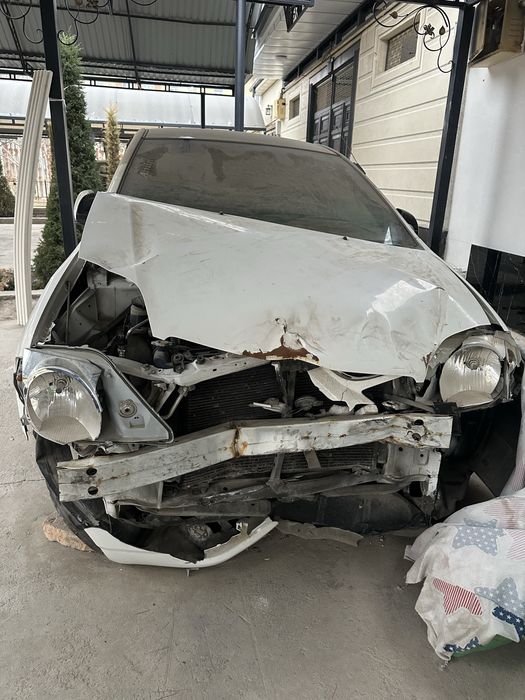 Тойота королла 2002 года