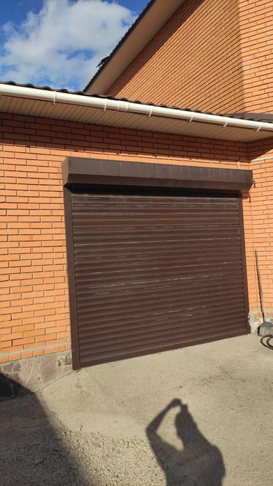 Ремонт секционных ворот,шлагбаумов.