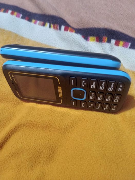 Telefoane cu butoane în stare perf