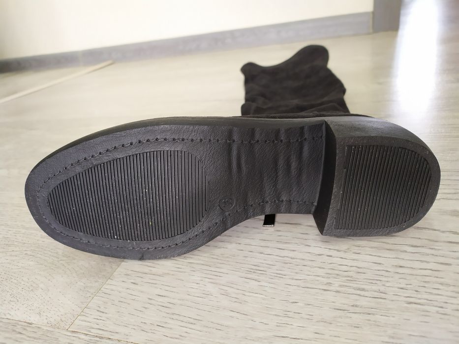 Продам новые сапоги