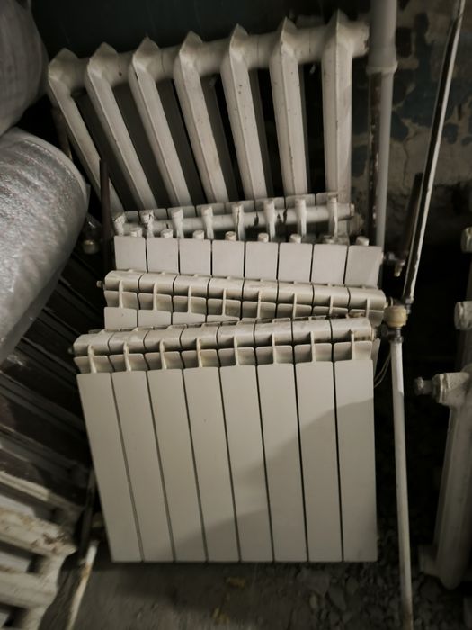 Продам батареи  чугунные