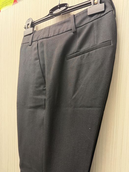 Pantaloni dama din stofa cu dungi Zara