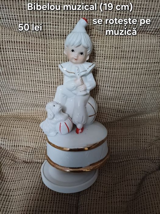 Păpuși porțelan muzicale