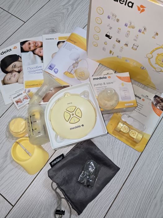 MEDELA Молокоотсос SWING электрический