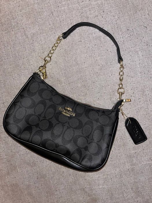 Woman’s Coach shoulder bag