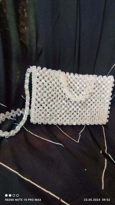 Trenddagi munchoqli sumka