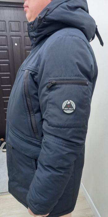 Продам мужской пуховик.