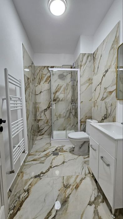 Apartament de închiriat cu garaj subteran bloc  nou!