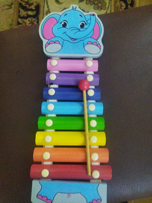 Ксилофон с палочкой.