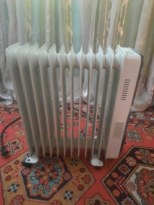Обогреватель электрический масленый.