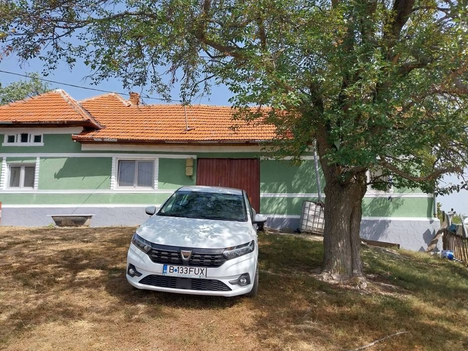 Casa și teren la munte