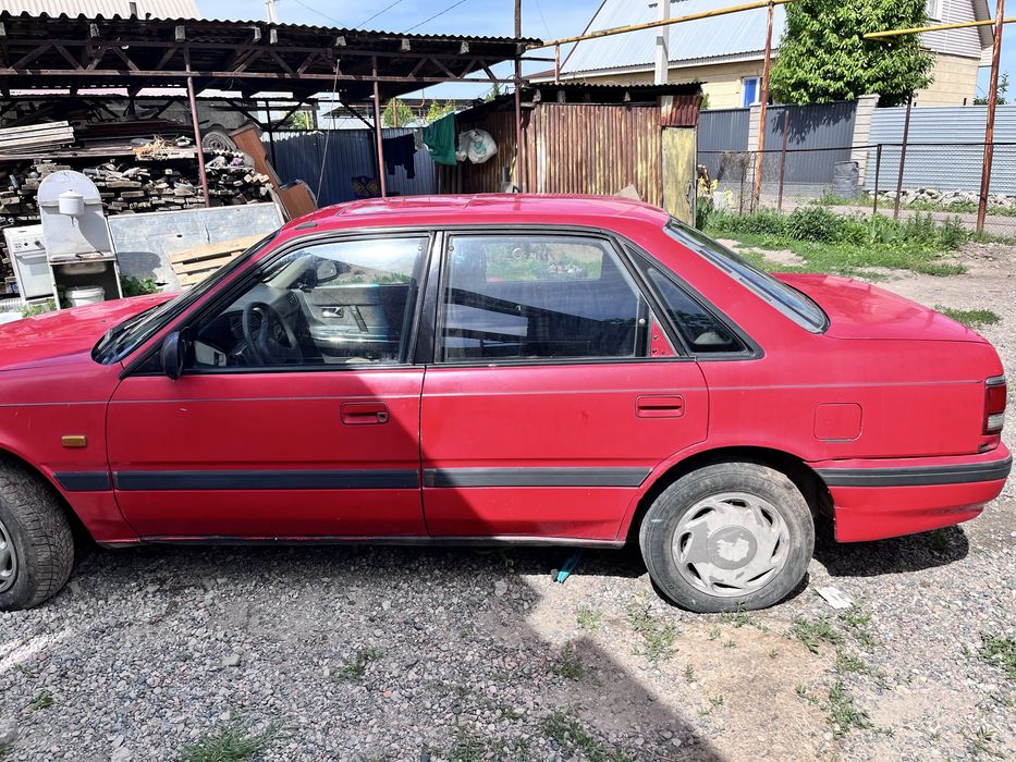 Машина Mazda 626
