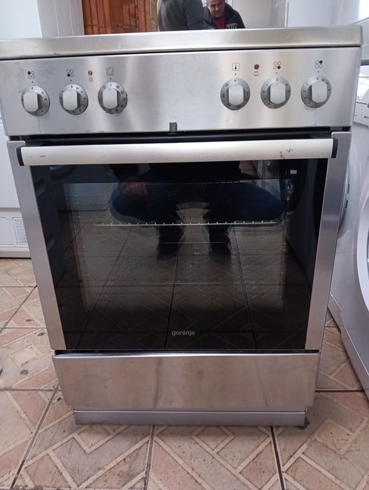 Иноксова свободно стояща печка с керамичен плот Gorenje 2 год.Гаранция