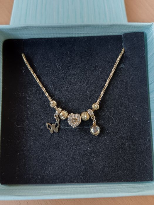 Продавам златна гривна пандора 14карата