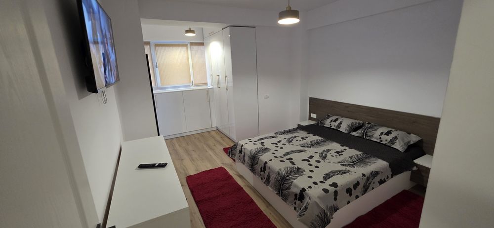 Inchiriez apartament cu 3 camere, complet utilat, bloc nou, loc de parcare