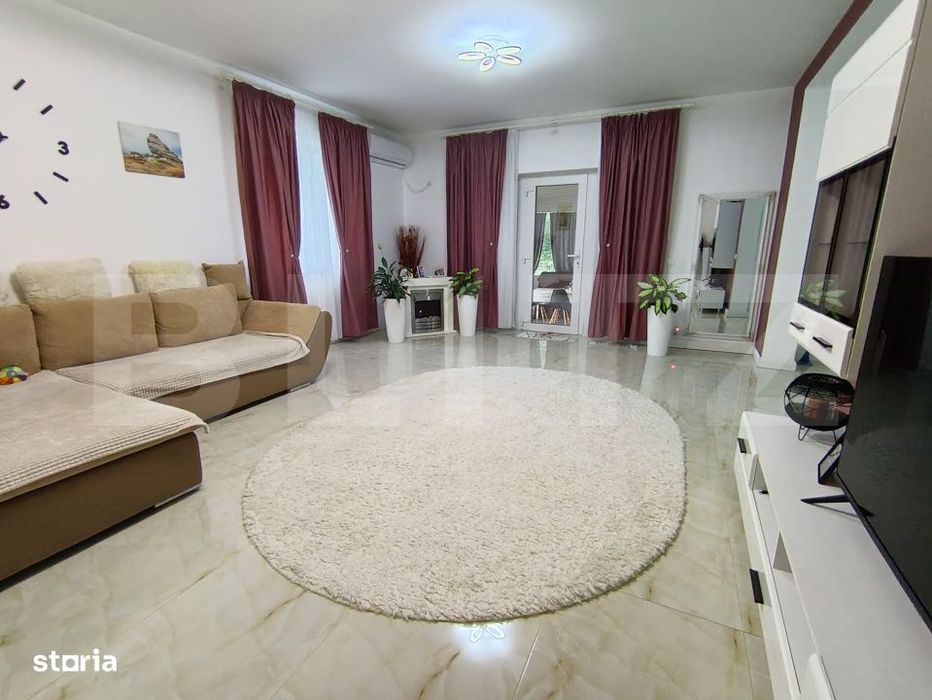 Casa ultra finisata si mobilata cu 3 camere 1 living si o terasa gener