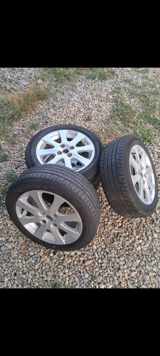 Vând jenti cu cauciucuri  4/100 distanta prizoane 185,  55 R15 dunlop