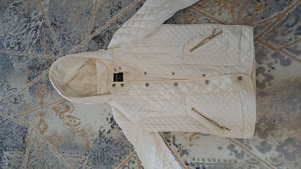 Куртки и пуховики