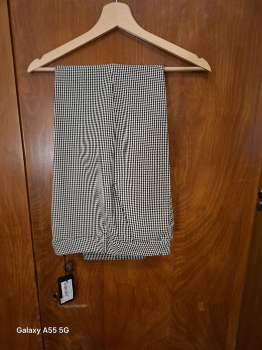 Уникален и стилен панталон пепит. Номер  44