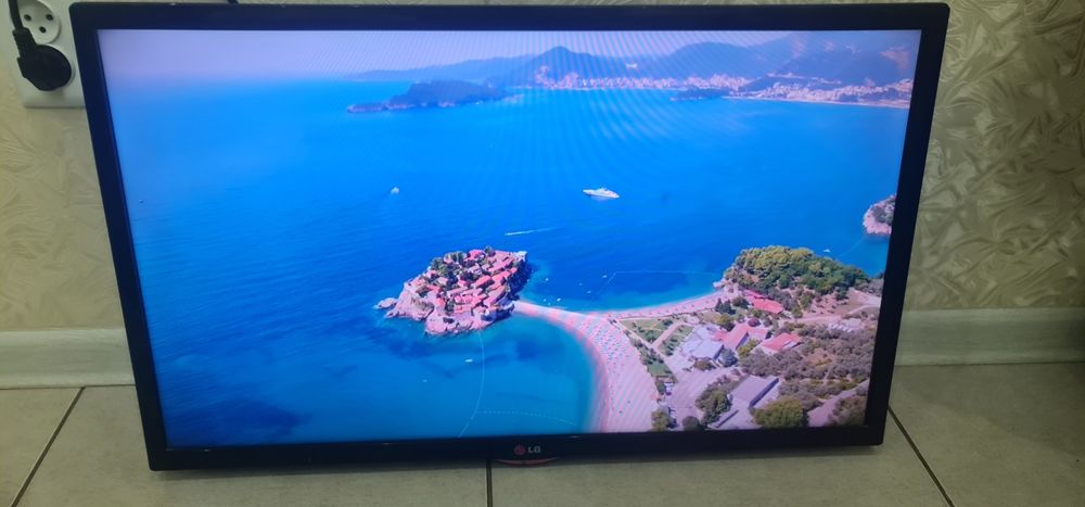 Смарт тв LG 81см.