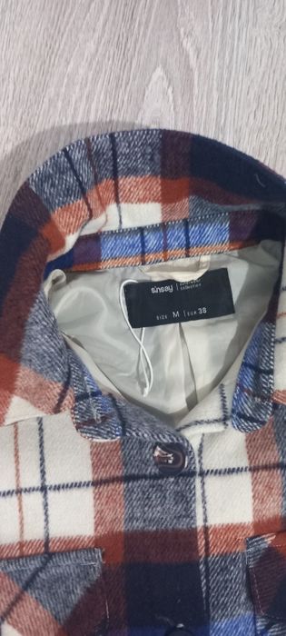 Vând jacket în carouri