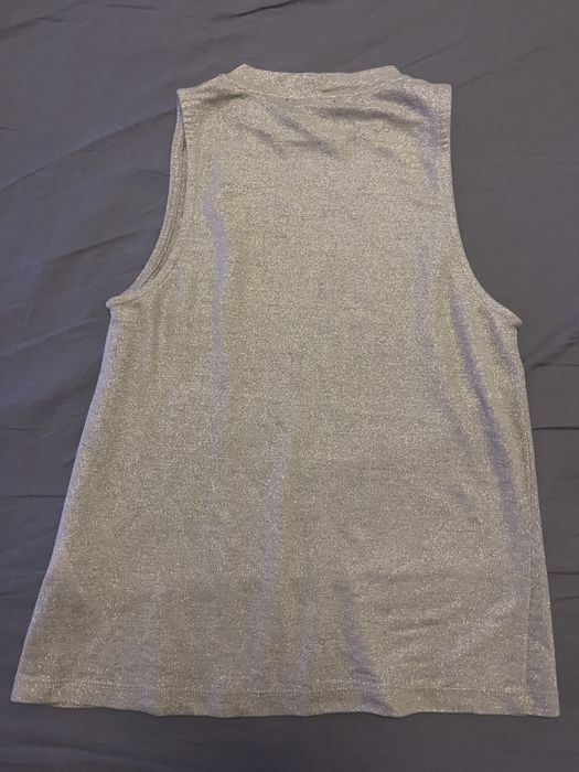 Maieu auriu fara maneci, Top