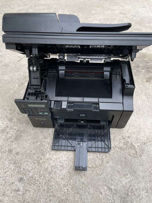 Принтер HP LaserJet M1214nfh MFP.