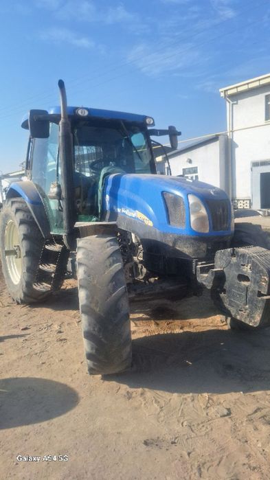 New Holland aylanma puliq bilan