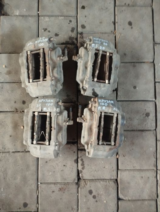 Toyota land cruiser 100 суппорт передний б/у оригинал цена за 1шт