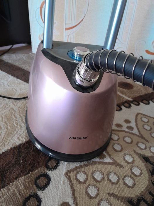 Паровой.       Утюг