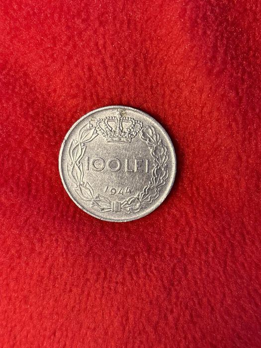 Vand moneda cu Regele Mihai 100 de lei stare perfecta